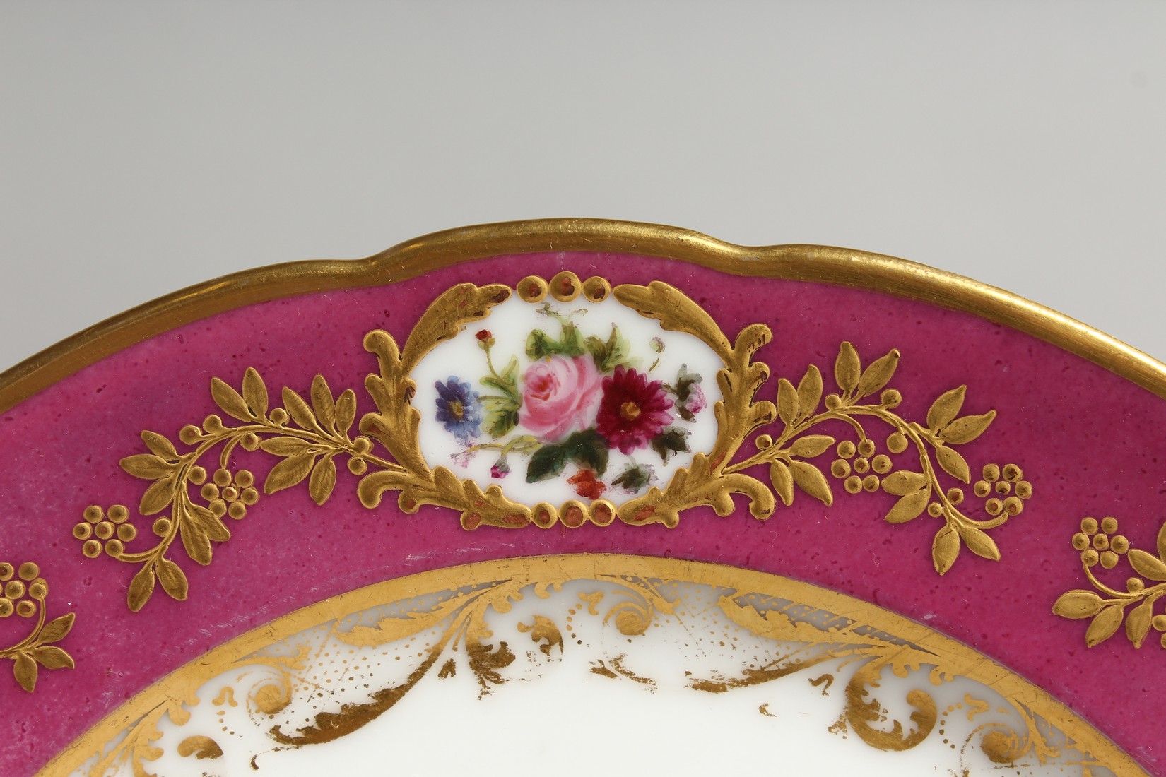 A 19TH CENTURY FRENCH DENVELLE PORCELAIN PLATE with rose coloured border, vignettes of flowers, gilt - Image 3 of 11