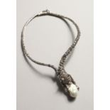 A SILVER AND MARCASITE PANTHER AND BAROQUE PEARL NECKLACE