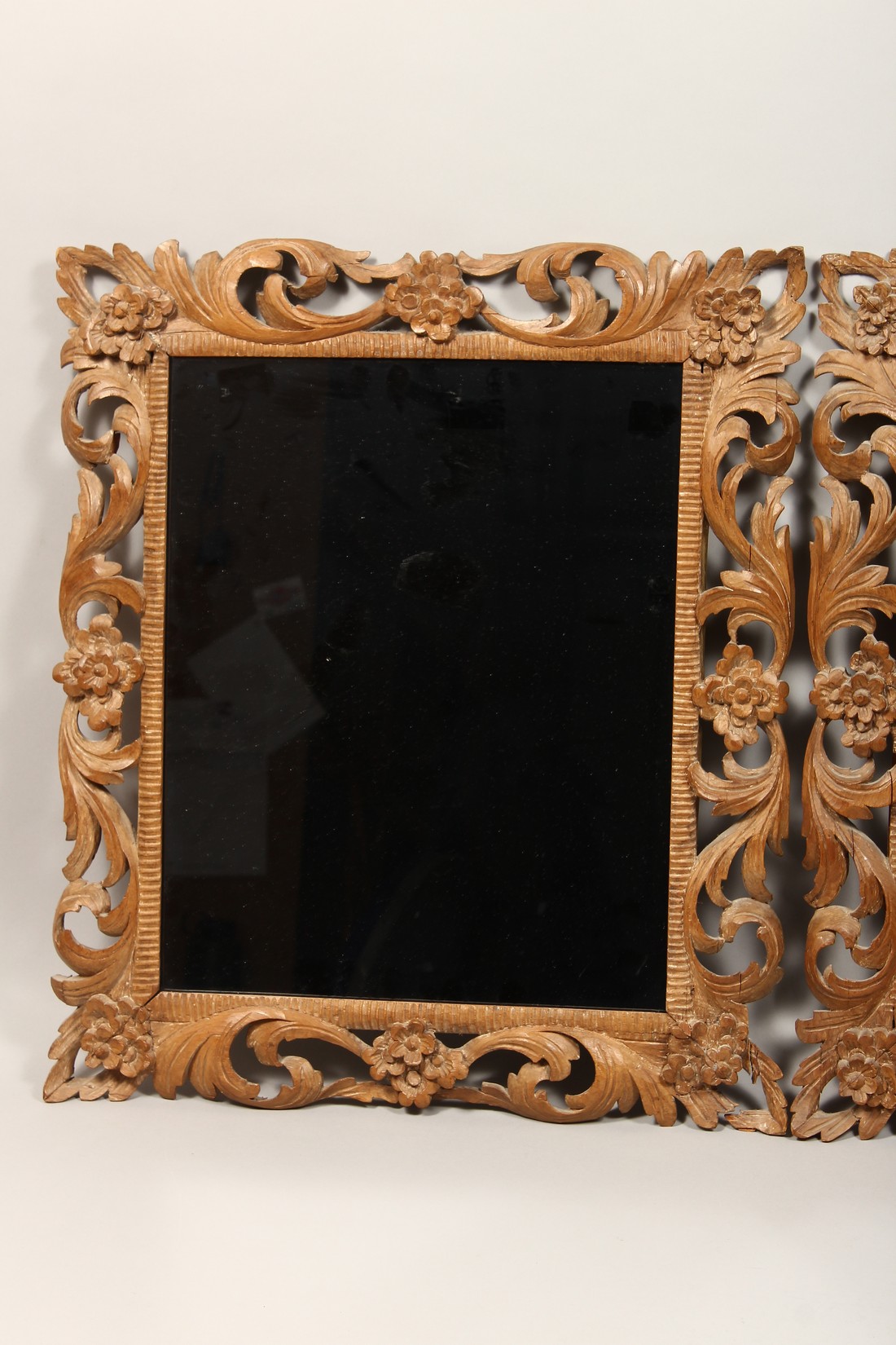 A PAIR OF 19TH CENTURY MIRRORS with leaf and flower carved wood frames 22ins x 19ins - Image 2 of 4