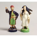 A SMALL PAIR OF FIGURES, TURKISH MAN AND LADY 5.5ins high.