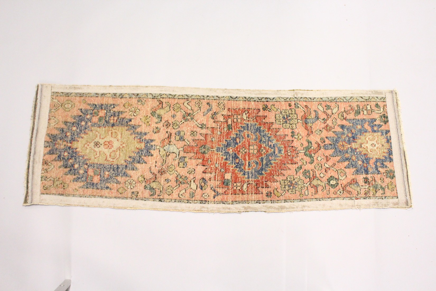 A SMALL HERIZ RUNNER, pink ground with three medallions 5ft 10ins x 1ft 11ins. - Image 2 of 2