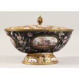 A VERY GOOD 19TH CENTURY ENAMEL CIRCULAR TUREEN AND COVER with various oval and circular scenes,