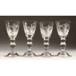 A SET OF FOUR HEAVY WINE GLASSES engraved with a man fishing 7.25ins high.