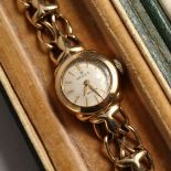 A LADIES 9CT GOLD ROLEX WRIST WATCH in original leather Rolex case.