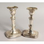 A GOOD PAIR OF VICTORIAN SILVER CANDLESTICKS 6.5ins high. Sheffield 1893