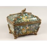 A LARGE, DECORATIVE PORCELAIN AND ORMOLU MOUNTED CASKET AND COVER 14.5ins long.