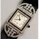 A SUPERB 1920'S CARTIER ART DECO DIAMOND AND SAPPHIRE COCKTAIL WATCH