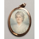 A VICTORIAN TWO SIDED OVAL MINIATURE OF A LADY