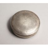 A SMALL DUTCH SILVER PILL BOX 1.5ins diameter.