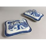 A PAIR OF BLUE AND WHITE SQUARE SHAPE TUREENS AND COVERS 9ins
