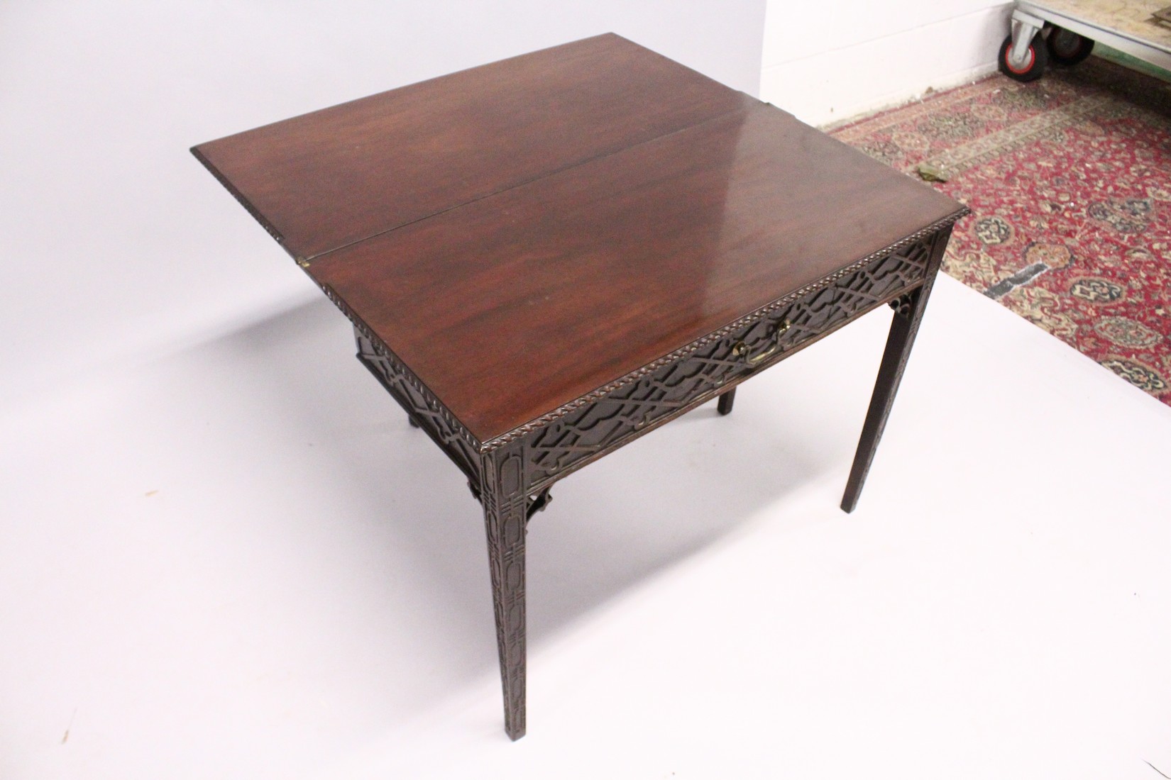 A GOOD GEORGE III MAHOGANY RECTANGULAR FOLDING TOP TEA TABLE with blind fret, curving and single - Image 3 of 7