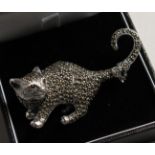 A SILVER AND MARCASITE CAT BROOCH