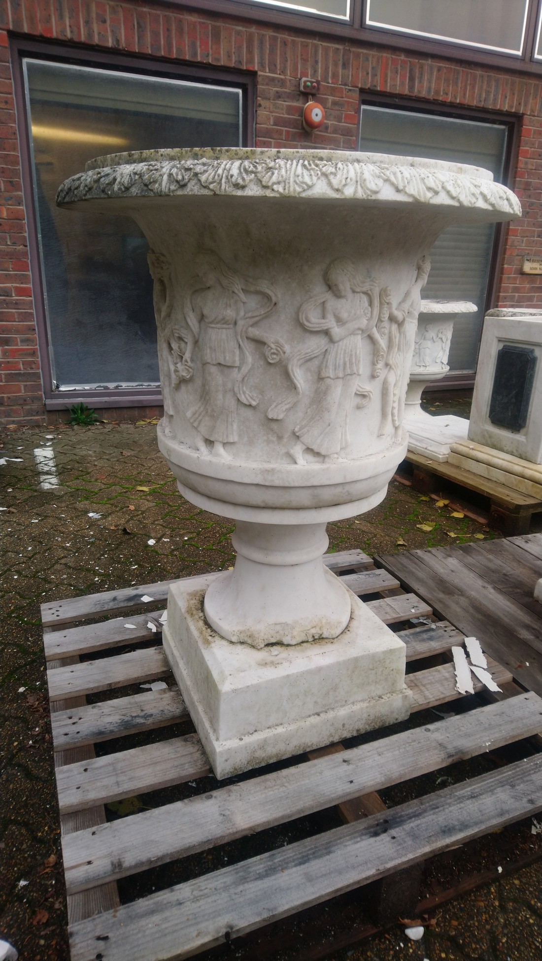 A GOOD PAIR OF ITALIAN CARVED WHITE MARBLE URNS , the sides carved with dancing muses 2ft 6ins high - Image 2 of 7