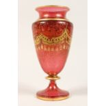 A BOHEMIAN RUBY AND GLASS VASE 9ins