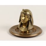 AN EGYPTIAN REVIVAL BRASS INKWELL