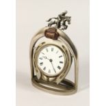 A HORSESHOE CLOCK, with horse and rider 10ins high.