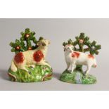 TWO STAFFORDSHIRE BOCAGE GROUPS OF A SHEEP with Bocage backs. 5.5ins & 4.5ins high.