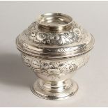 A GEORGE II CIRCULAR SUGAR BOWL AND COVER with repousse decoration London 1753 Maker James Swift