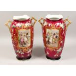 A LARGE PAIR OF 19TH CENTURY FRENCH PORCELAIN TWO HANDLED VASES painted with a panel of figures