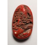 A CARVED CHINESE RED HARD STONE BOULDER. 3.5ins long