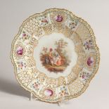 A 19TH CENTURY MEISSEN CIRCULAR PLATE with vignettes of flowers and buildings, the centre with young