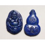 TWO CARVED LAPIS PENDANTS