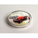 AN OVAL SILVER RACING CAR PILL BOX