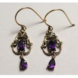 A PAIR OF 9CT GOLD AMETHYST DROP EAR RINGS