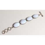 A CHARLES ALBERT SILVER AND AGATE BRACELET.