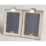 A PAIR OF SILVER WRYTHEN UPRIGHT PHOTOGRAPH FRAMES 8.5ins x 5.5ins