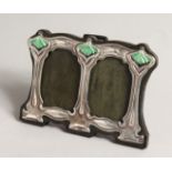 A SMALL DOUBLE SILVER PHOTOGRAPH FRAME 3ins x 4ins.