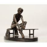 BENSON LANDES (BORN 1927) BRTITISH A BRONZE MODEL OF A BALLERINA, seated on a bench. Limited Edition
