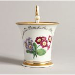 A 19TH CENTURY MEISSEN CAUDLE CUP, inscribed and painted with flowers. Mark in blue.