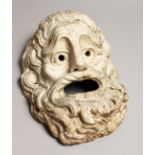 AN INTERESTING CARVED MARBLE ROMAN HEAD with open mouth and eyes and curly hair. 13ins long