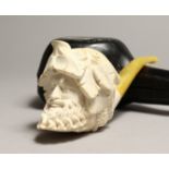 A 19TH CENTURY MEERSCHAUM PIPE as the head of BACCHUS, in a leather case.