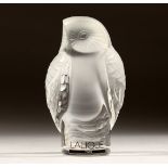 A LALIQUE GLASS OWL, engraved Lalique, France, in a fitted box 3.75ins high