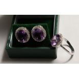 A PAIR OF SILVER AMETHYST AND ZIRCON EAR RINGS AND RING.