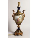A 19TH CENTURY SEVRES BLUE GROUND TWO HANDLED VASES, converted to lamps, painted with reverse