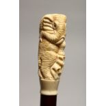 A WALKING STICK WITH CARVED BONE HANDLE, modelled an elephant.
