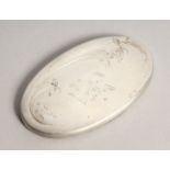 A SMALL RUSSIAN SILVER OVAL HAND MIRROR with initials A. H. 4 V 30. Marked .875. 3ins x 1.25ins