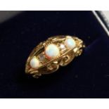A GOLD PLATED OPAL AND DIAMOND RING.