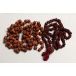 TWO STRINGS OF MONKS BEADS