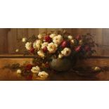 Kees Terlouw (1890-1948) Dutch, A still life study of roses in a bowl, oil on board, signed, in a