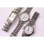 Three gent's stainless steel wristwatches.