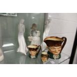 Three Lladro figurines and Doulton character jugs.