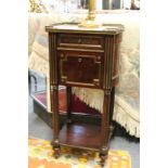 A 19th century French mahogany and marble top pot cupboard.