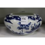 A small Chinese blue and white circular bowl.