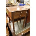 A 19th century mahogany two drawer drop flap work table.