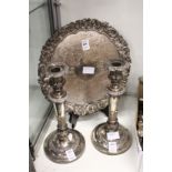An Old Sheffield Plate pair of candlesticks and an ornate salver.