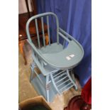 An old fashioned style high-chair.